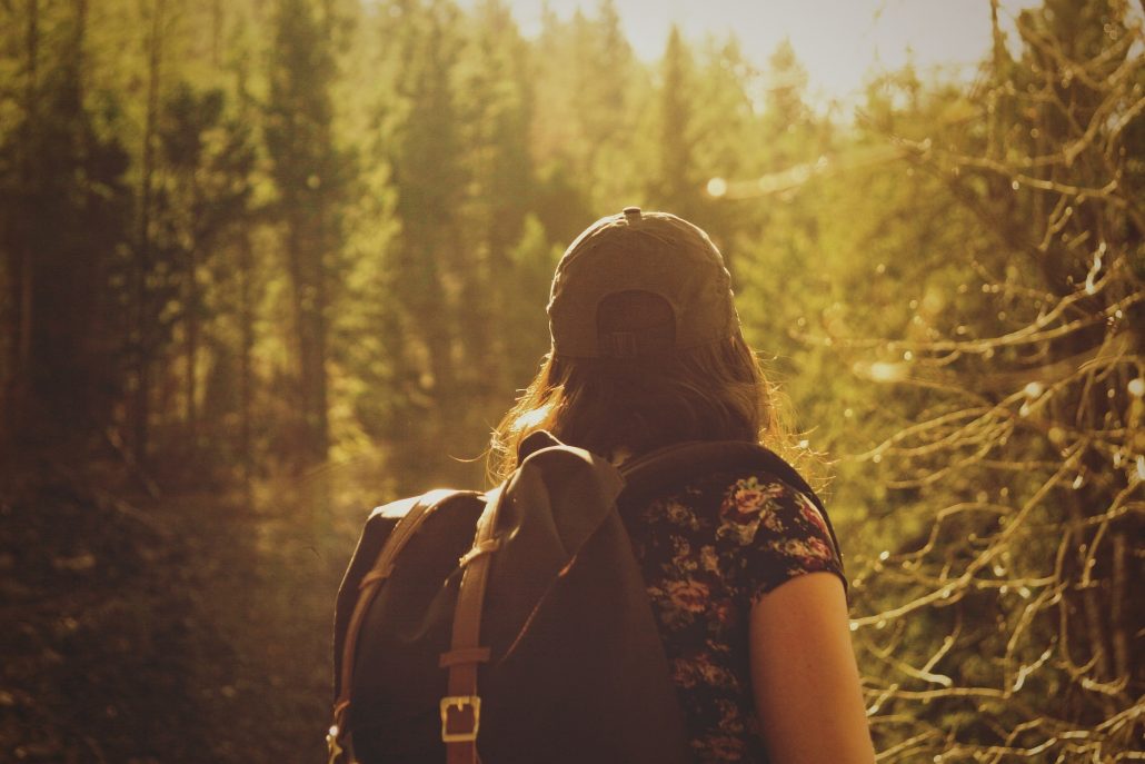 girl in forest hiking