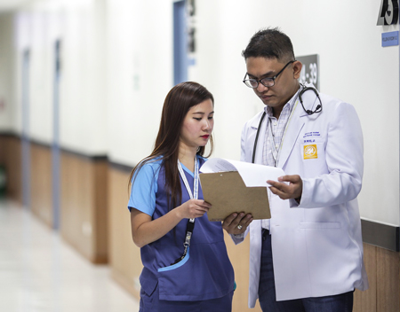 doctor and a nurse working together